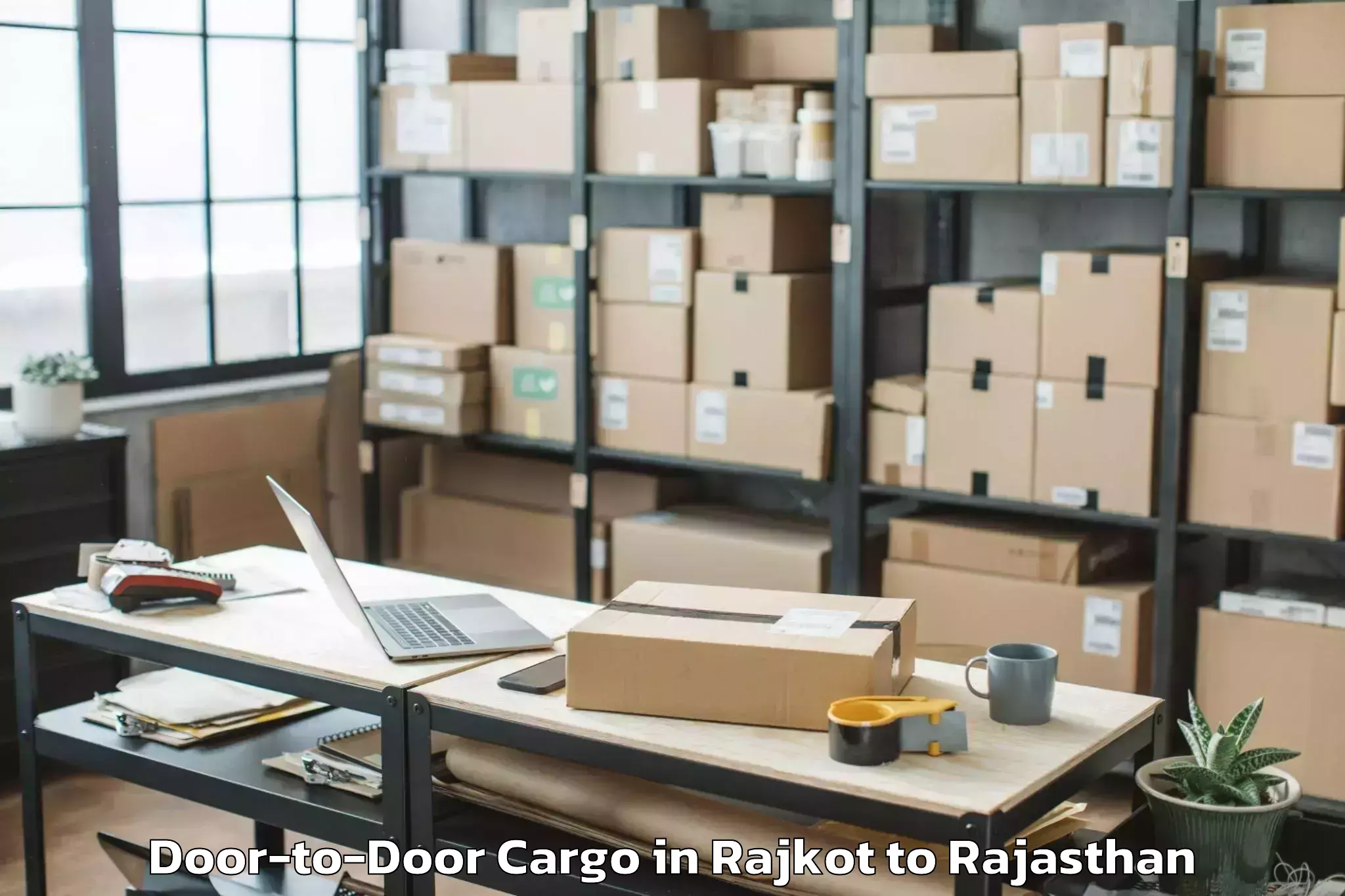 Leading Rajkot to Malpura Door To Door Cargo Provider